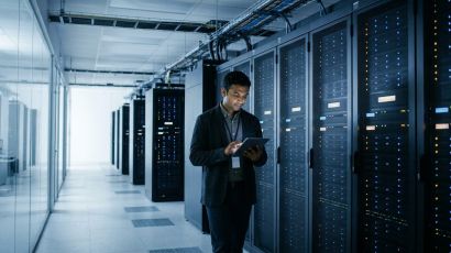 IT systems engineer monitoring continuous compliance in a data centre using the puppet infrastructure automation guide.